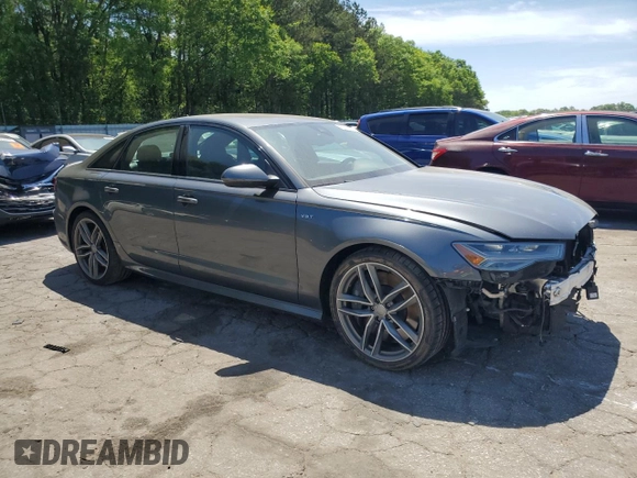 2017 Audi S6 Premium Plus z VIN WAUFFAFCXHN012281, wystawiony jako Copart lot #53571455 z przebiegiem 67 439 mil mil oraz Szkoda całkowita • Salvage title. Historia ofert i sprzedaży dostępna na DreamBid. Obrazek 4.