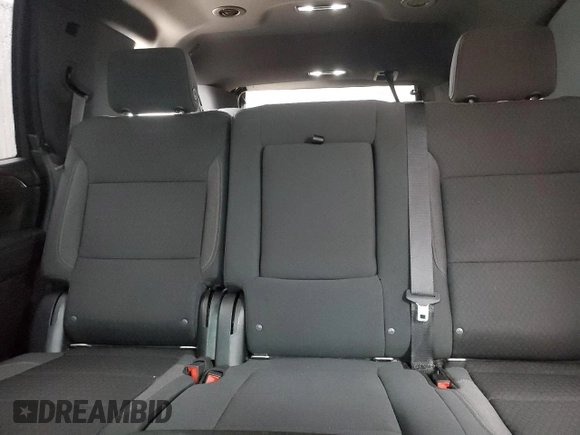 2021 Chevrolet Tahoe LS with VIN 1GNSCMKD4MR335973, listed as a Copart auction lot 69972594 with 42,129 mi miles and Salvage title. Bid and sale history available at DreamBid. Image 10.
