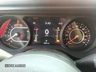 2024 Jeep Wrangler Sport S with VIN 1C4PJXDNXRW110431, listed as a IAAI auction lot 42156570 with 9,699 mi miles. Bid and sale history available at carsss.com. Image 7.