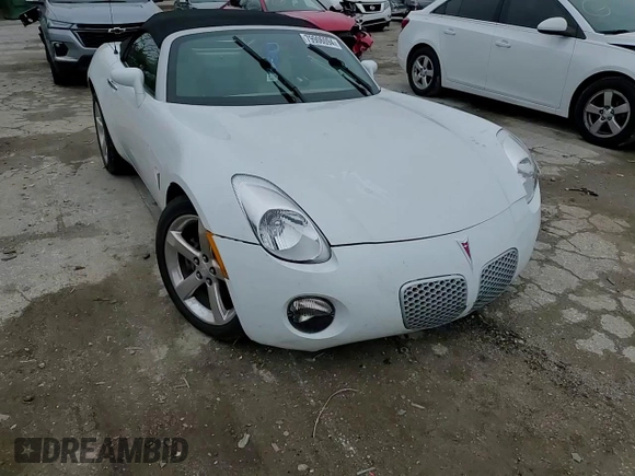 2006 Pontiac Solstice z VIN 1G2MB33B56Y106095, wystawiony jako Copart lot #79906094 z przebiegiem 54 475 mil mil oraz Szkoda całkowita • Salvage title. Historia ofert i sprzedaży dostępna na DreamBid. Obrazek 10.