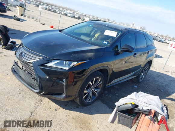 2018 Lexus RX 450hL Premium z VIN JTJDGKCA1J2004770, wystawiony jako IAAI lot #41329524 z przebiegiem 86 774 mil mil oraz . Historia ofert i sprzedaży dostępna na DreamBid. Obrazek 17.
