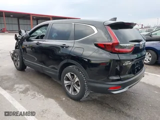 2020 Honda CR-V LX with VIN 2HKRW2H2XLH671349, listed as a IAAI auction lot 41204020 with 71,374 mi miles. Bid and sale history available at carsss.com. Image 3.