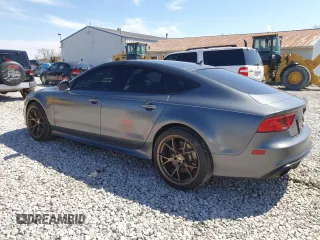2015 Audi RS 7 Prestige z VIN WUAW2AFC8FN900610, wystawiony jako Copart lot #50708225 z przebiegiem 103 811 mil mil oraz Szkody całkowita. Historia ofert i sprzedaży dostępna na DreamBid. Obrazek 2.