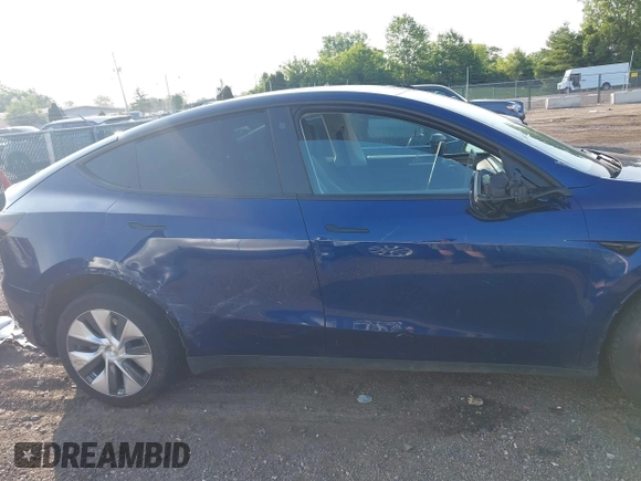2023 Tesla Model Y Long Range with VIN 7SAYGDEE0PF671726, listed as a IAAI auction lot 42393616 with Not provided miles and . Bid and sale history available at DreamBid. Image 13.