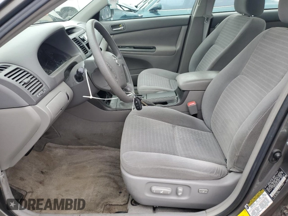 2005 Toyota Camry LE z VIN 4T1BE30K05U579984, wystawiony jako Copart lot #58482875 z przebiegiem 74 638 mil mil oraz Szkoda całkowita • Salvage title. Historia ofert i sprzedaży dostępna na DreamBid. Obrazek 7.