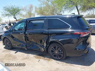 2021 Toyota Sienna XSE with VIN 5TDXRKEC6MS021909, listed as a IAAI auction lot 42432609 with 57,295 mi miles and . Bid and sale history available at DreamBid. Image 14.