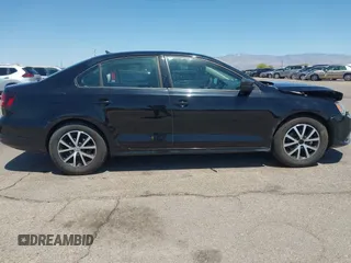 2016 Volkswagen Jetta Sedan 1.4T SE with VIN 3VWD67AJ8GM368642, listed as a IAAI auction lot 42087079 with 90,974 mi miles. Bid and sale history available at carsss.com. Image 13.