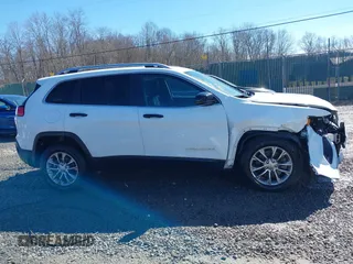 2021 Jeep Cherokee Altitude with VIN 1C4PJLLBXMD164087, listed as a IAAI auction lot 41694113 with 76,352 mi miles. Bid and sale history available at carsss.com. Image 13.