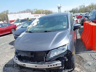 2018 Honda Odyssey Touring with VIN 5FNRL6H8XJB029570, listed as a IAAI auction lot 41485794 with 77,601 mi miles. Bid and sale history available at carsss.com. Image 12.