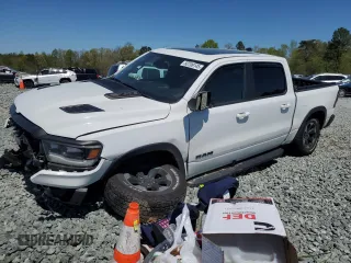 2019 Ram 1500 Rebel z VIN 1C6RRFLG3KN720429, wystawiony jako Copart lot #50709145 z przebiegiem 115 836 mil mil oraz Szkoda całkowita • Salvage title. Historia ofert i sprzedaży dostępna na DreamBid. Obrazek 1.