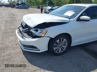 2015 Volkswagen Jetta SE z VIN 3VWD17AJXFM327152, wystawiony jako IAAI lot #42055458 z przebiegiem 69 412 mil mil oraz . Historia ofert i sprzedaży dostępna na DreamBid. Obrazek 6.