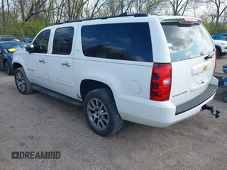 2013 Chevrolet Suburban LT with VIN 1GNSKJE79DR328718, listed as a IAAI auction lot 42005926 with 168,610 mi miles and . Bid and sale history available at DreamBid. Image 3.