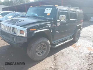 2003 Hummer H2 with VIN 5GRGN23U33H144379, listed as a IAAI auction lot 41452982 with 227,746 mi miles. Bid and sale history available at carsss.com. Image 17.