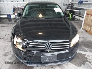 2014 Volkswagen Passat S with VIN 1VWAT7A37EC035831, listed as a IAAI auction lot 42648263 with 118,081 mi miles and . Bid and sale history available at DreamBid. Image 6.