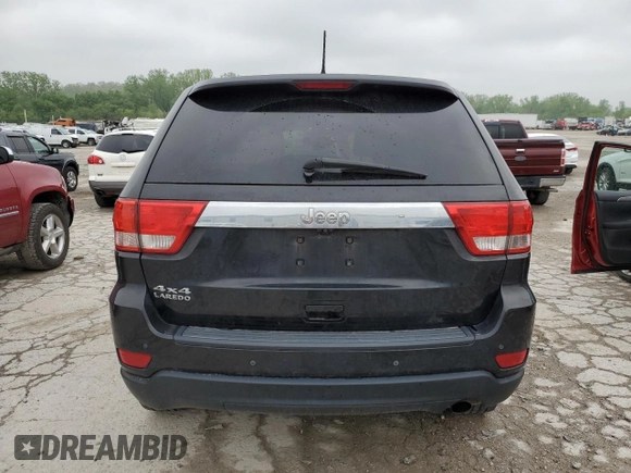 2011 Jeep Grand Cherokee Laredo z VIN 1J4RR4GG2BC662746, wystawiony jako Copart lot #53989845 z przebiegiem 138 402 mil mil oraz Szkoda całkowita • Salvage title. Historia ofert i sprzedaży dostępna na DreamBid. Obrazek 6.