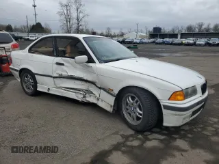 1997 BMW 3 Series 328is with VIN WBABG132XVET04869, listed as a Copart auction lot 45774015 with 123,280 mi miles and Salvage Title. Bid and sale history available at carsss.com. Image 4.