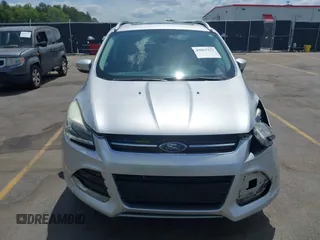 2014 Ford Escape Titanium with VIN 1FMCU0JX7EUA28824, listed as a IAAI auction lot 42065325 with 107,761 mi miles. Bid and sale history available at carsss.com. Image 12.