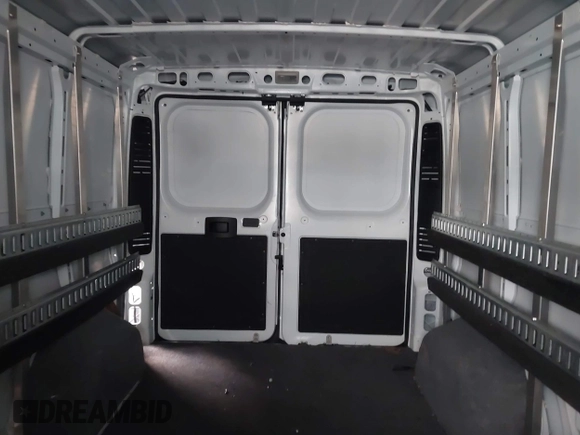 2023 Ram ProMaster Cargo with VIN 3C6LRVVG3PE603829, listed as a IAAI auction lot 41682802 with 8,408 mi miles and . Bid and sale history available at DreamBid. Image 7.