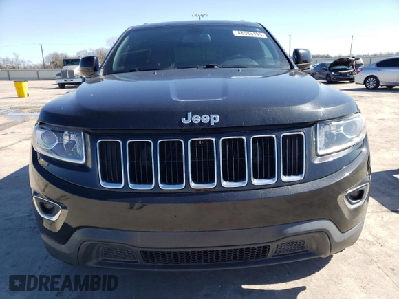2014 Jeep Grand Cherokee Laredo with VIN 1C4RJEAGXEC217249, listed as a Copart auction lot 48585195 with 131,635 mi miles and Salvage Title. Bid and sale history available at DreamBid. Image 5.