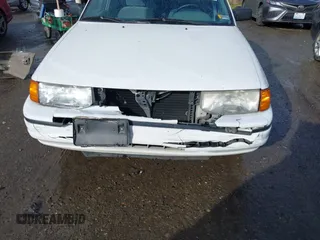 1993 Ford Escort z VIN 3FAPP13J9PR205353, wystawiony jako IAAI lot #41837169 z przebiegiem 4016 mil mil oraz . Historia ofert i sprzedaży dostępna na DreamBid. Obrazek 14.
