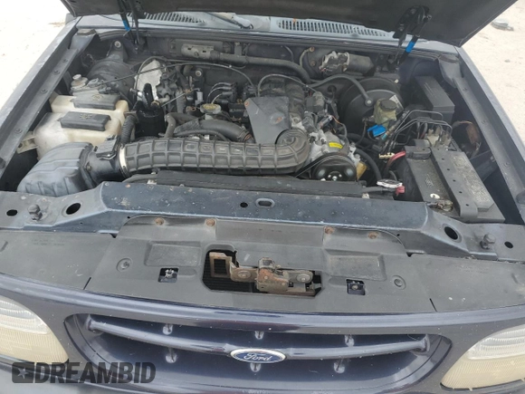 2000 Ford Explorer XLS z VIN 1FMZU62X4YZB47949, wystawiony jako Copart lot #82259804 z przebiegiem 127 673 mil mil oraz Nie do naprawy • Non repairable. Historia ofert i sprzedaży dostępna na DreamBid. Obrazek 11.