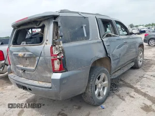 2020 Chevrolet Tahoe LT with VIN 1GNSCBKC1LR103972, listed as a IAAI auction lot 42148438 with 94,640 mi miles and . Bid and sale history available at DreamBid. Image 4.