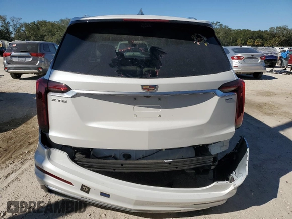 2024 Cadillac XT6 FWD Premium Luxury with VIN 1GYKPCRS4RZ742995, listed as a Copart auction lot 82802774 with 5,898 mi miles and Salvage Title. Bid and sale history available at carsss.com. Image 6.