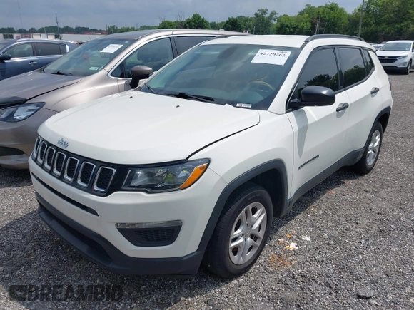 2018 Jeep Compass Sport with VIN 3C4NJCAB0JT124679, listed as a IAAI auction lot 42720262 with 119,267 mi miles and . Bid and sale history available at DreamBid. Image 6.