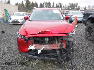 2023 Mazda CX-5 2.5 S Premium Package with VIN JM3KFBDM1P0161605, listed as a IAAI auction lot 41626777 with 26,581 mi miles. Bid and sale history available at carsss.com. Image 13.
