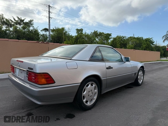 1994 Mercedes-Benz SL with VIN WDBFA63E0RF094472, listed as a Copart auction lot 58923925 with 55,706 mi miles and Clean title. Bid and sale history available at DreamBid. Image 4.