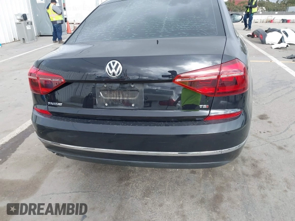 2019 Volkswagen Passat 2.0T Wolfsburg Edition with VIN 1VWLA7A34KC012887, listed as a IAAI auction lot 41792604 with 70,237 mi miles. Bid and sale history available at carsss.com. Image 17.