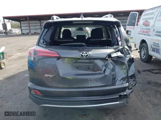 2018 Toyota RAV4 XLE with VIN JTMWFREV1JJ169926, listed as a IAAI auction lot 41464920 with 111,144 mi miles. Bid and sale history available at carsss.com. Image 16.