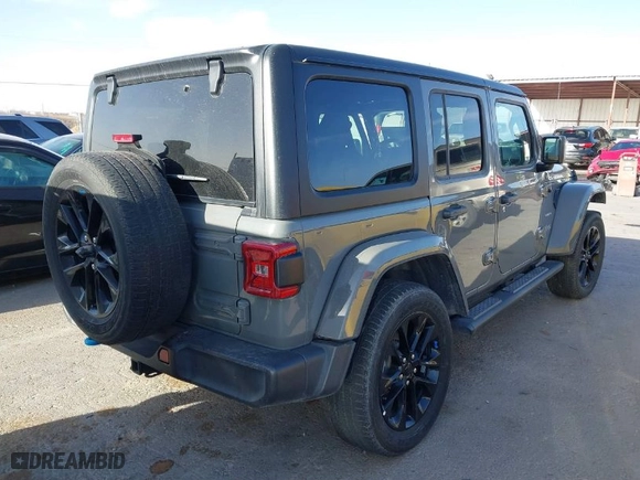 2023 Jeep Wrangler 4xe Sahara with VIN 1C4JJXP68PW661190, listed as a IAAI auction lot 41816483 with 41,877 mi miles. Bid and sale history available at carsss.com. Image 4.