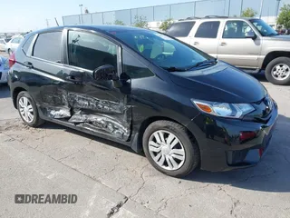 2015 Honda Fit LX with VIN 3HGGK5G5XFM737172, listed as a IAAI auction lot 42053332 with 80,690 mi miles. Bid and sale history available at carsss.com. Image 1.