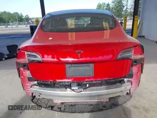 2020 Tesla Model 3 Standard Range Plus z VIN 5YJ3E1EA7LF611669, wystawiony jako IAAI lot #42179974 z przebiegiem 17 696 mil mil oraz . Historia ofert i sprzedaży dostępna na DreamBid. Obrazek 6.