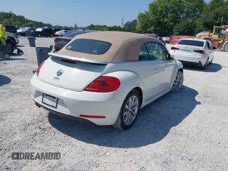 2013 Volkswagen Beetle 2.5L with VIN 3VW5P7AT3DM811617, listed as a IAAI auction lot 42055769 with 93,810 mi miles and . Bid and sale history available at DreamBid. Image 4.