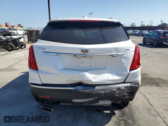 2019 Cadillac XT5 FWD with VIN 1GYKNARS1KZ121732, listed as a Copart auction lot 54882885 with 72,142 mi miles and Salvage title. Bid and sale history available at DreamBid. Image 6.