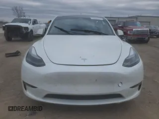 2023 Tesla Model Y Performance with VIN 7SAYGDEF0PF791552, listed as a Copart auction lot 44592545 with 29,075 mi miles and Salvage Title. Bid and sale history available at DreamBid. Image 5.
