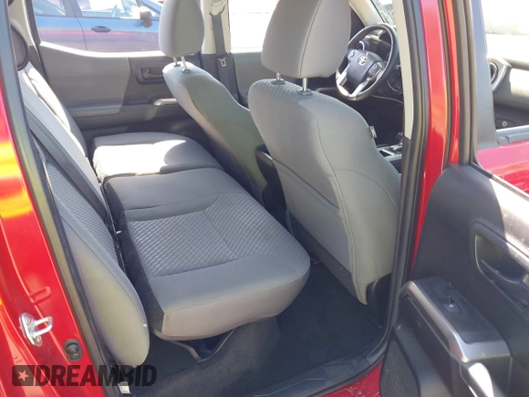 2022 Toyota Tacoma SR with VIN 3TMCZ5AN7NM470900, listed as a IAAI auction lot 42060911 with 38,869 mi miles and . Bid and sale history available at DreamBid. Image 8.