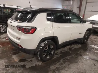 2018 Jeep Compass Trailhawk with VIN 3C4NJDDB2JT328269, listed as a IAAI auction lot 41597957 with 66,789 mi miles and . Bid and sale history available at carsss.com. Image 4.