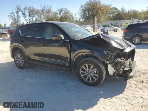 2023 Mazda CX-5 S Select with VIN JM3KFBBM2P0237142, listed as a Copart auction lot 47841235 with 16,911 mi miles and Salvage Title. Bid and sale history available at DreamBid. Image 4.