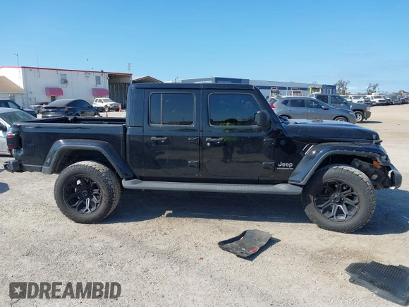2020 Jeep Gladiator Overland with VIN 1C6HJTFG2LL149056, listed as a IAAI auction lot 41524168 with 113,503 mi miles and . Bid and sale history available at DreamBid. Image 13.