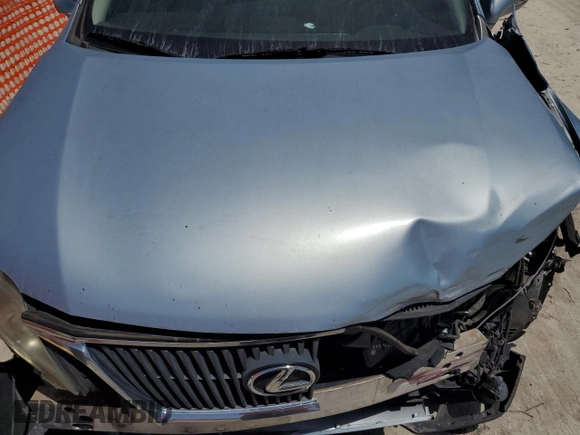 2011 Lexus RX 350 with VIN 2T2ZK1BA9BC056651, listed as a Copart auction lot 57199025 with 104,949 mi miles and Salvage title. Bid and sale history available at DreamBid. Image 12.