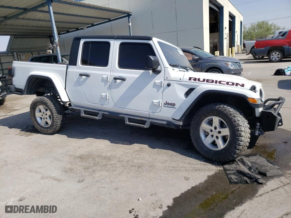 2020 Jeep Gladiator Rubicon with VIN 1C6JJTBG3LL138767, listed as a Copart auction lot 58490974 with 48,542 mi miles and Salvage Title. Bid and sale history available at carsss.com. Image 4.