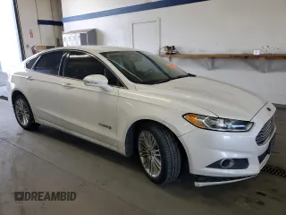 2014 Ford Fusion SE Hybrid with VIN 3FA6P0LU7ER349951, listed as a Copart auction lot 48247925 with 197,441 mi miles and Salvage Title. Bid and sale history available at DreamBid. Image 4.