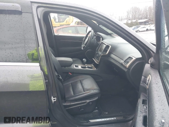 2015 Jeep Grand Cherokee Summit with VIN 1C4RJFJM6FC955904, listed as a IAAI auction lot 41483446 with 65,970 mi miles. Bid and sale history available at carsss.com. Image 5.