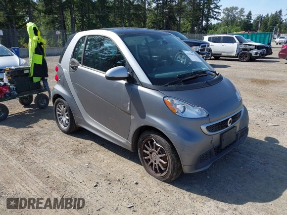 2013 Smart fortwo Pure с VIN WMEEJ3BA5DK622812, выставлен на аукционе IAAI как лот 42356026 с пробегом 64 983 миль миль и . История ставок и продаж доступна на DreamBid. Изображение 1.