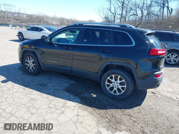 2015 Jeep Cherokee Latitude z VIN 1C4PJMCS2FW620113, wystawiony jako IAAI lot #41865228 z przebiegiem 186 983 mil mil oraz . Historia ofert i sprzedaży dostępna na DreamBid. Obrazek 3.