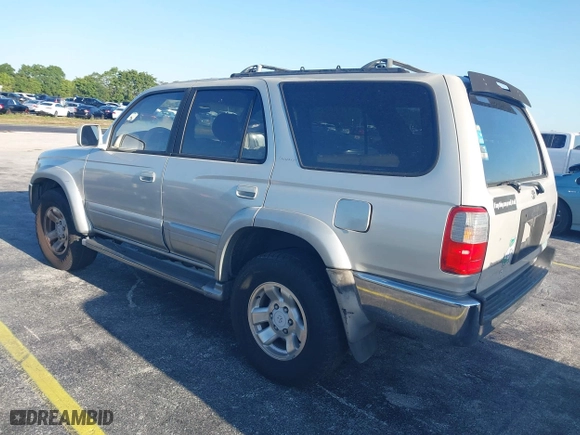 1997 Toyota 4Runner Limited with VIN JT3GN87R3V0043679, listed as a IAAI auction lot 42043029 with 296,834 mi miles. Bid and sale history available at carsss.com. Image 3.