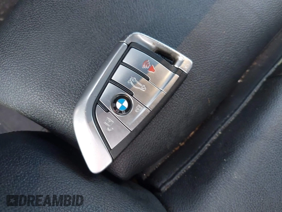 2019 BMW 5 Series 530e with VIN WBAJA9C58KB399175, listed as a IAAI auction lot 41697211 with Not provided miles and . Bid and sale history available at DreamBid. Image 11.